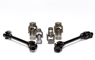 Close-up of machine part against white background