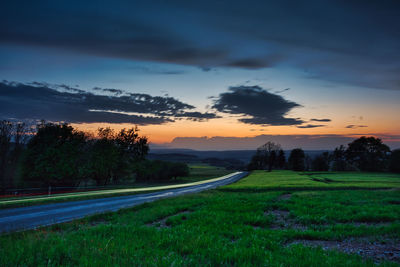 Scenic view of landscape against sky during sunset