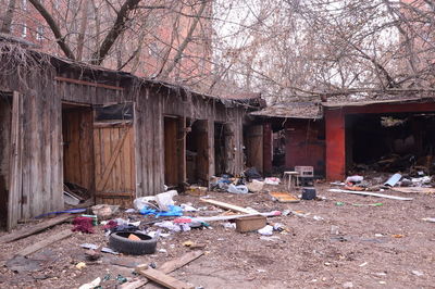 Abandoned house by building