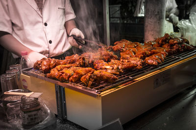 Close-up of meat on barbecue grill