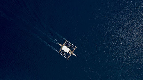 High angle view of sailboat in sea