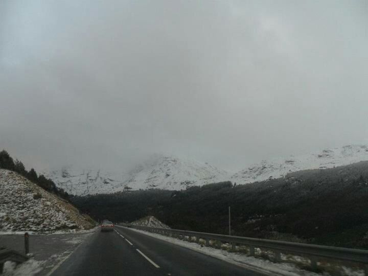 transportation, the way forward, road, winter, weather, snow, diminishing perspective, cold temperature, road marking, vanishing point, mountain, country road, sky, season, fog, nature, empty road, tranquility, beauty in nature, street