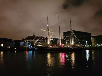 Boats moored at harbor