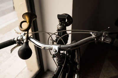 Close-up of retro styled car horn on bicycle handlebar