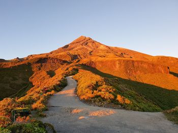 Scenic view of mountain against clear sky