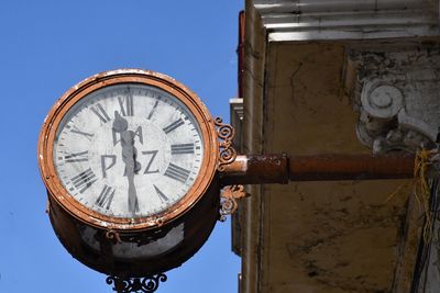 Low angle view of clock