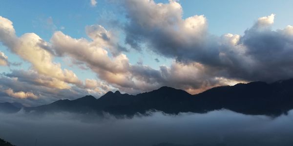Low angle view of clouds in sky during sunset