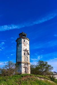 Low angle view of old tower against sky