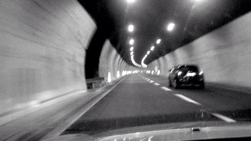 Blurred motion of car in tunnel