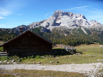 Built structure on mountain against sky