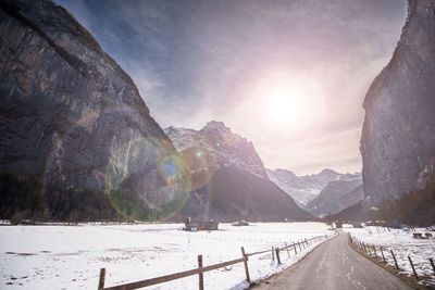 Scenic view of snow mountains against sky