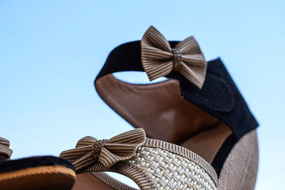 Low angle view of hat against clear sky