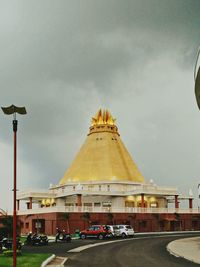 View of road against cloudy sky