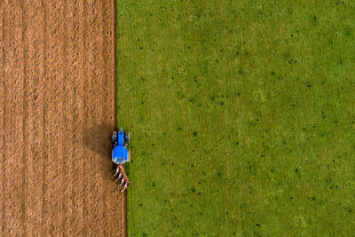 High angle view of tractor on agricultural field