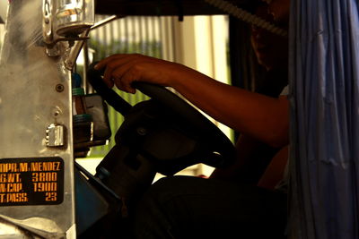 Close-up of woman standing against white background