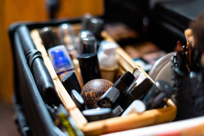 Close-up of beauty products in container