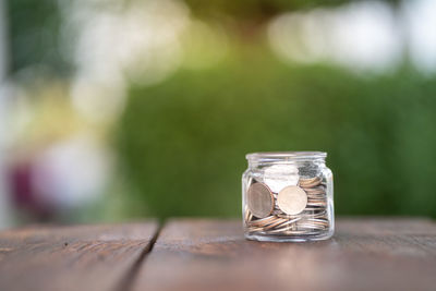 Close-up of coins on table