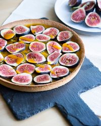 High angle view of raw fig tart on table