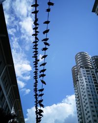 Low angle view of skyscrapers against sky