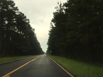 Road passing through country road