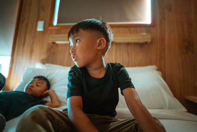 Close-up of boy looking away