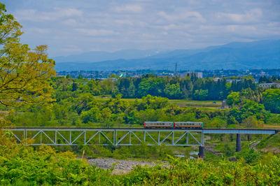 High angle view of bridge over river against sky