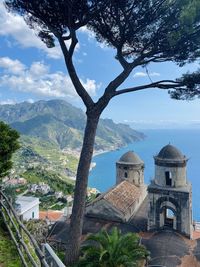 View of trees and buildings against sky