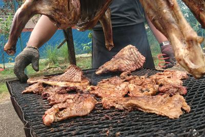 Close-up of meat on barbecue grill