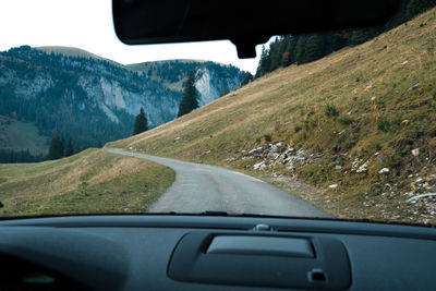 Road seen through car windshield