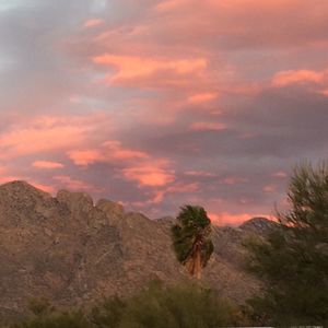 Scenic view of mountains at sunset