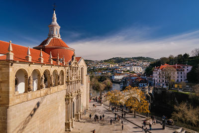 Buildings in city against sky