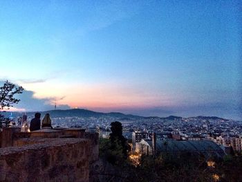 View of cityscape at sunset