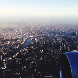 Aerial view of cityscape against sky