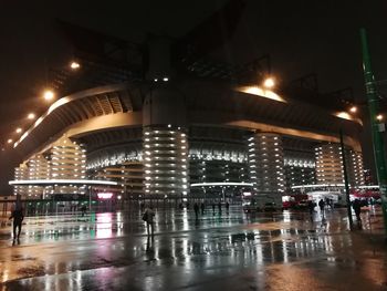 Illuminated buildings in city at night