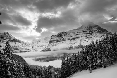 Scenic view of mountains against sky during winter