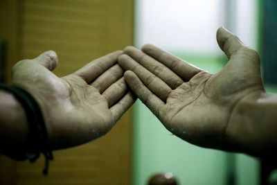 Close-up of man hand with tattoo