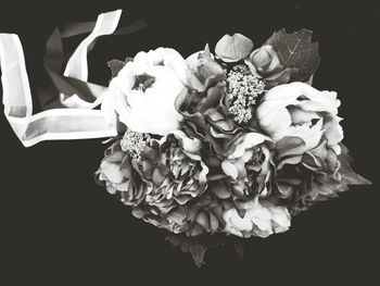 Close-up of bouquet against black background