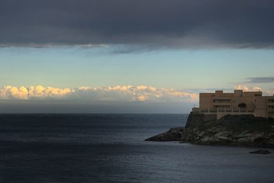 Scenic view of sea at sunset