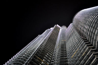 Low angle view of tower at night