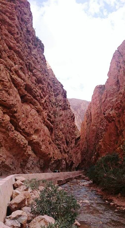 nature, rock - object, rock formation, geology, beauty in nature, physical geography, sky, scenics, outdoors, travel destinations, day, tranquility, landscape, cloud - sky, no people, canyon