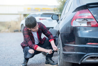 Rear view of boy in car