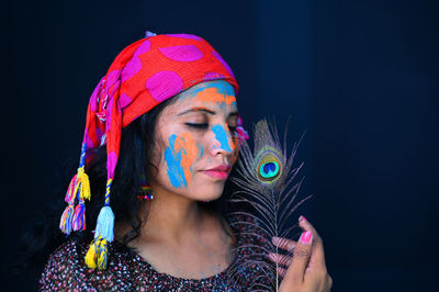 A young girl celebrating the festival of colours, holi.