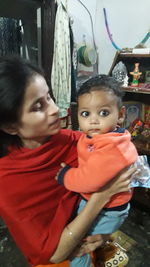 Portrait of cute girl with mother and son