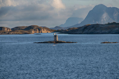 Boat sailing in sea against sky