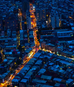 High angle view of illuminated buildings at night