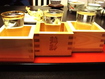 Close-up of glasses on table