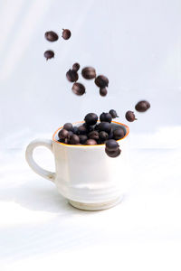 Close-up of coffee on white background