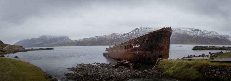 Scenic view of sea against sky during winter