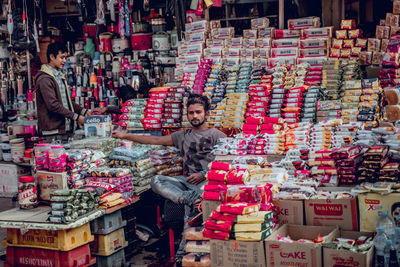 Group of people at market stall