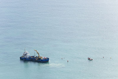 People on boat in sea